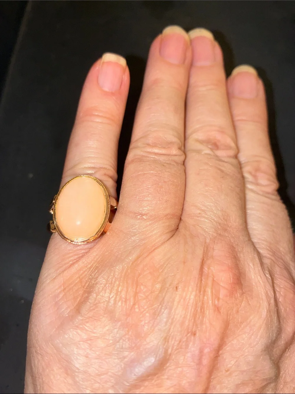Gold-Tone Stretch Ring with Peach Cabochon Center
